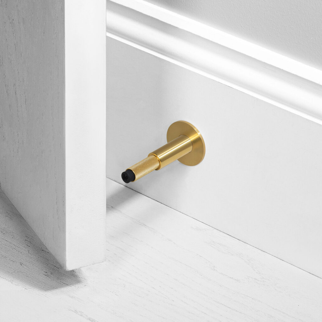1. Door_Stop_Wall_Brass