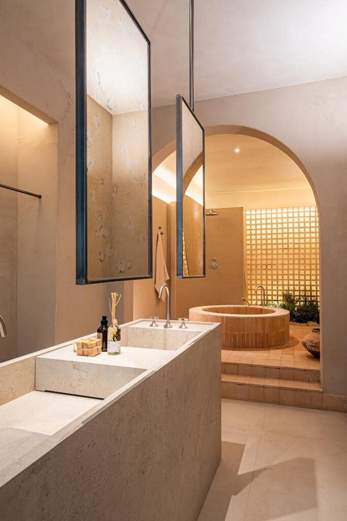 TerraVista Smooth fine-grained clay finishing plaster and TerraSilk Smooth clay paint both in Panna (cream) color applied to panels in the Mediterranean spa stand at the Marbella Design & Art fair. Project by Nina Dubarry Photography by Jose Gallardo